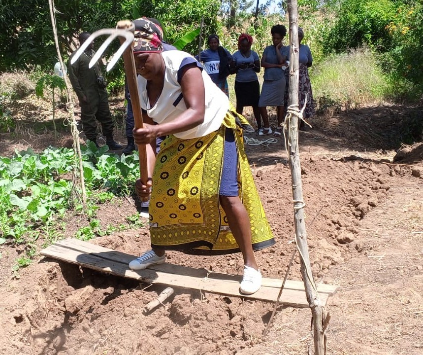 Double-digging demonstration biointensive farming Kenya